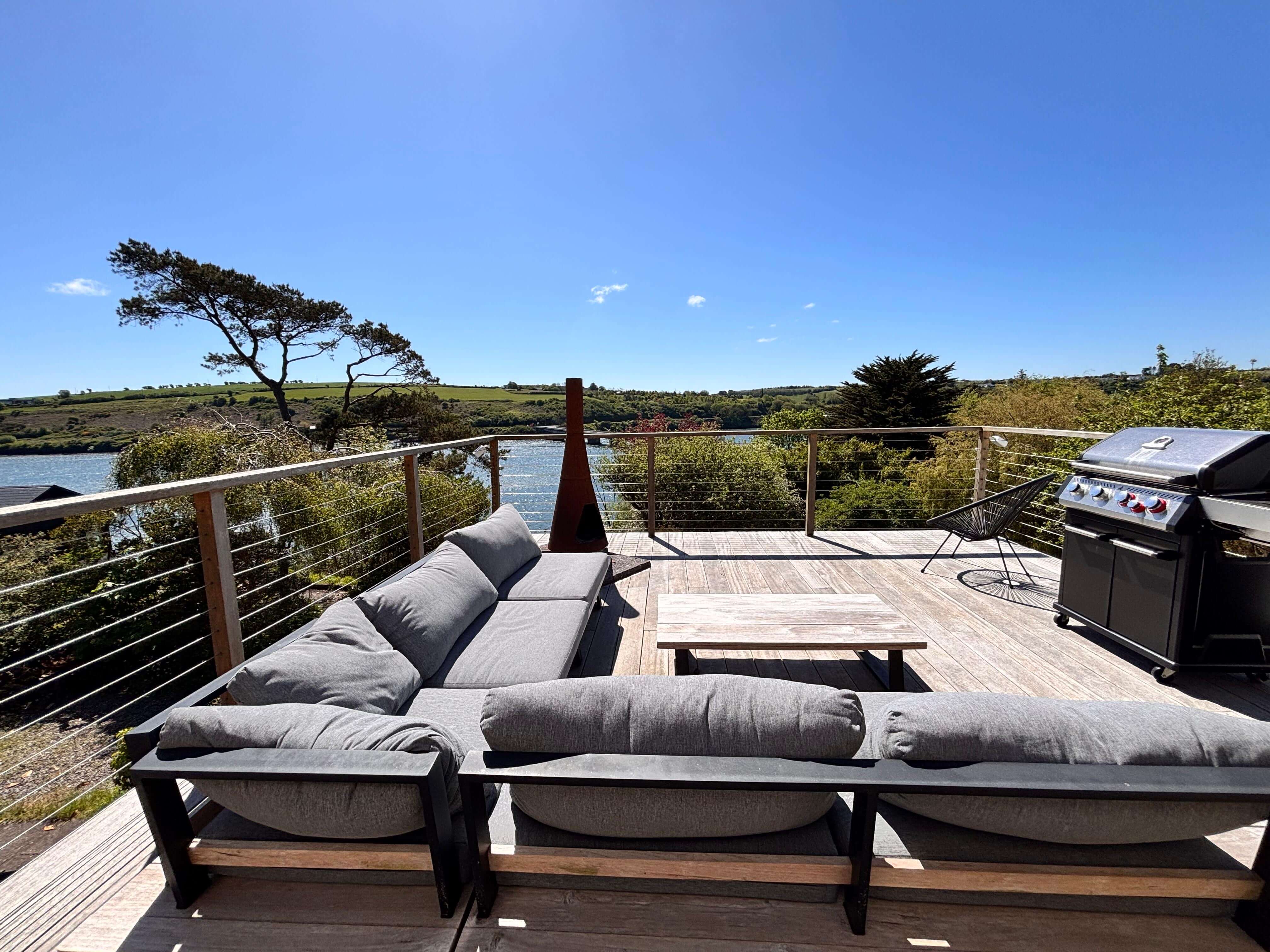 Upper deck lounge and BBQ with river view